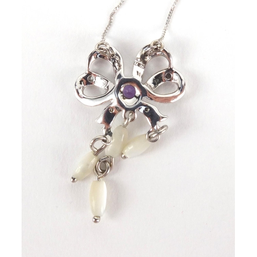 2531 - 9ct white gold pendant necklace set with amethyst, diamonds and Mother of pearl, 40cm in length, app... 