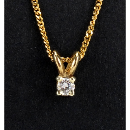 2565 - 9ct gold diamond solitaire pendant on a 9ct gold necklace, housed in a Theo Fennell box