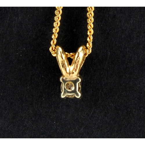 2565 - 9ct gold diamond solitaire pendant on a 9ct gold necklace, housed in a Theo Fennell box