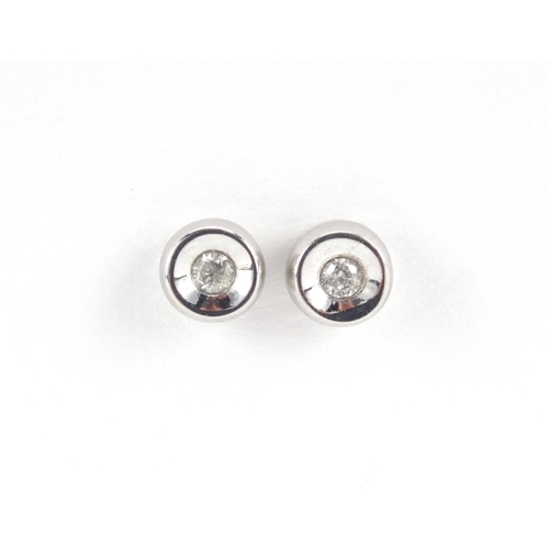 2552 - Pair of 9ct white gold diamond solitaire earrings, approximate weight 1.1g