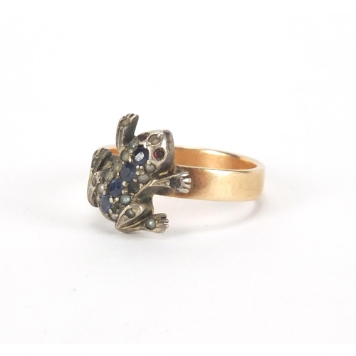 2583 - Unmarked gold ring mounted with a frog and set with assorted stones, size O, approximate weight 4.3g