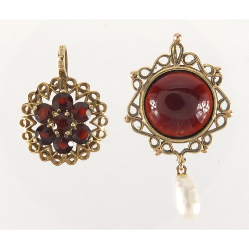 2606 - 9ct gold garnet cluster pendant and a gold coloured metal cabochon garnet pendant, approximate weigh... 