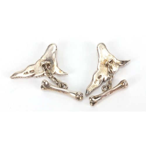 2651 - Pair of Irish silver walrus cuff links, originally retailed by David Morris