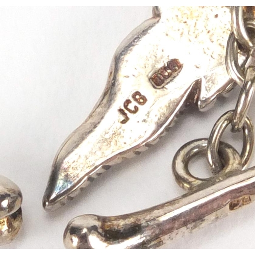 2651 - Pair of Irish silver walrus cuff links, originally retailed by David Morris