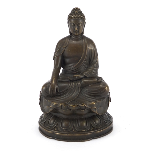 2393 - Chinese bronzed figure of a Buddha seated in the Lotus position, 17cm high