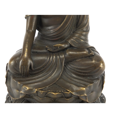 2393 - Chinese bronzed figure of a Buddha seated in the Lotus position, 17cm high