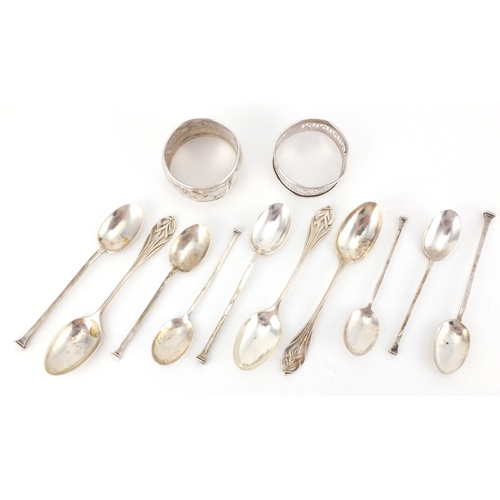 2436 - Silver items comprising seven Mappin & Webb teaspoons, two napkin rings and a set of three teaspoons... 