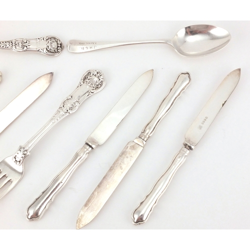 2444 - Silver cutlery comprising Georgian table spoon, Victorian fork, one other spoon and set of six silve... 