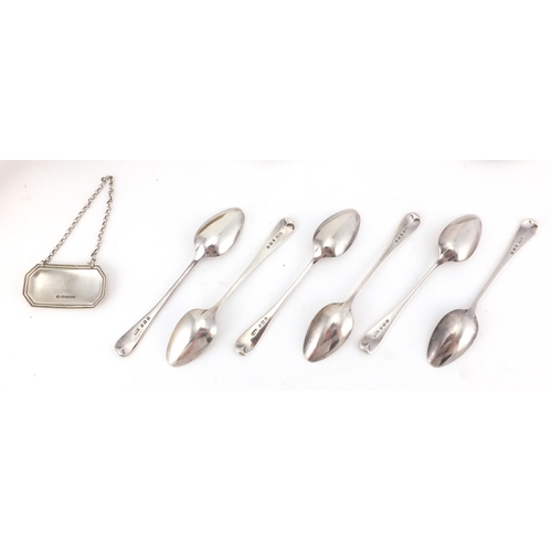 2434 - Silver items, pair of Georgian table spoons, set of six teaspoons, whisky decanter label and a silve... 