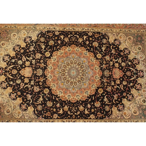 2006 - Very fine rectangular Persian Tabriz silk rug, having all over scrolling foliage within meandering v... 