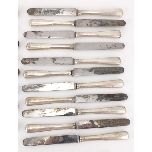 2445 - Group of French silver handled knives, the largest 27cm in length