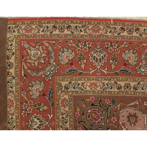 2006 - Very fine rectangular Persian Tabriz silk rug, having all over scrolling foliage within meandering v... 