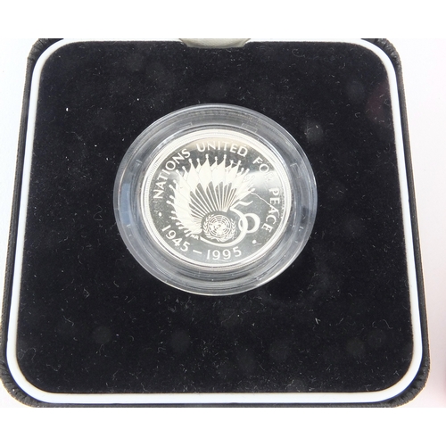 2457 - Two silver proof Piedfort two pound coins together with a 2001 Britannia one ounce silver two pound