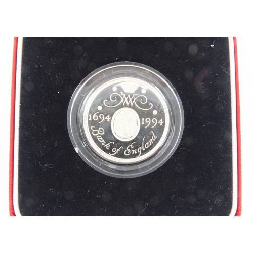 2457 - Two silver proof Piedfort two pound coins together with a 2001 Britannia one ounce silver two pound