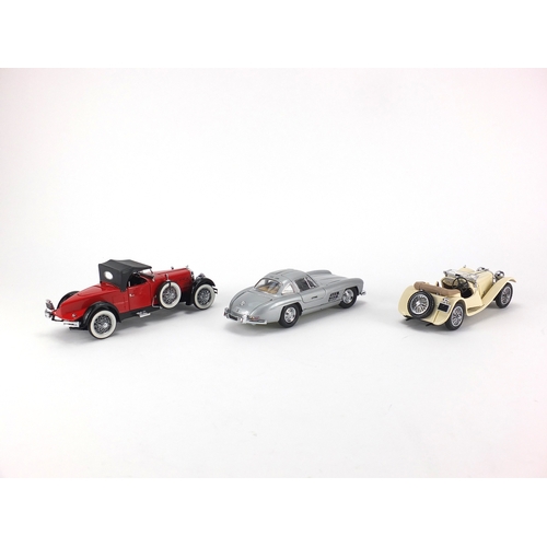 2378 - Three Franklin Mint die cast vehicles, all with boxes, 1928 Stutz Black Hawk Boattail Speedster, 193... 