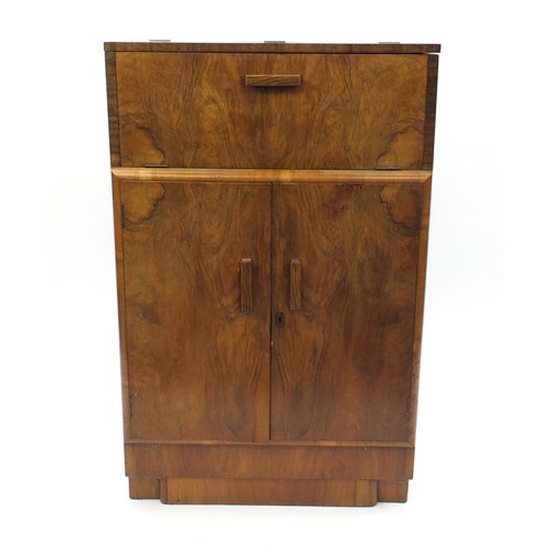 7 - Art Deco walnut cocktail cabinet with mechanical action top above a pair of cupboard doors, 110cm H ... 