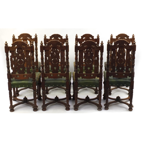17 - Set of eight profusely carved oak dining chairs, with green leather seats and X stretchers, 102cm hi... 