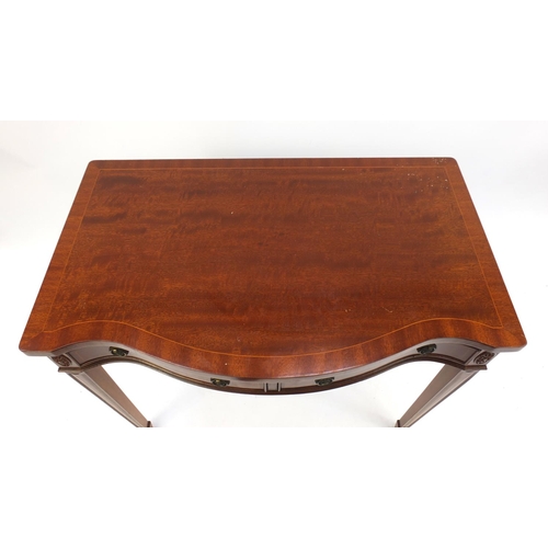 16 - Inlaid mahogany serpentine front serving table raised on tapering legs, 77cm H x 91cm W x 56cm D