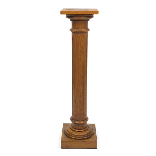 46 - Fluted oak pedestal, 108cm high