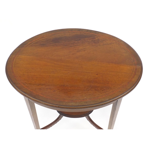 61 - Edwardian oval inlaid mahogany two tier occasional table, 73cm high