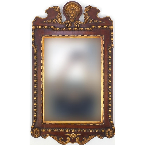 2037 - Rectangular walnut bevelled edge mirror with gilt decoration, 93cm x 52cm