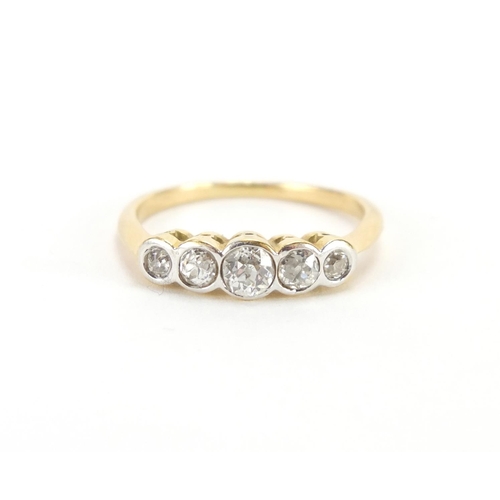 833 - Unmarked gold diamond five stone ring, size M approximate weight 2.9g