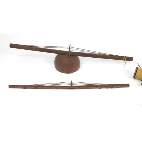 577 - African musical instruments including a bamboo Valiha from Madagascar and a Muette from Congo, the V... 