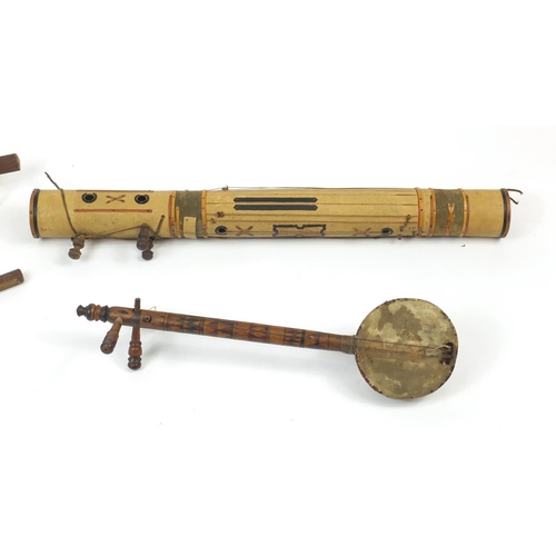 577 - African musical instruments including a bamboo Valiha from Madagascar and a Muette from Congo, the V... 