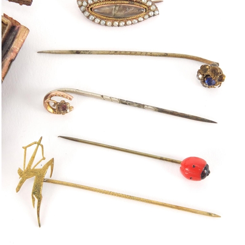 892 - Group of gold coloured metal tie pins set with assorted stones including coral, turquoise, pearl and... 