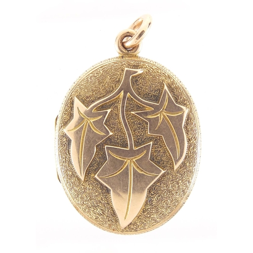 857 - Victorian unmarked gold locket with ivy leaf decoration, 4cm in length, approximate weight 12.7g