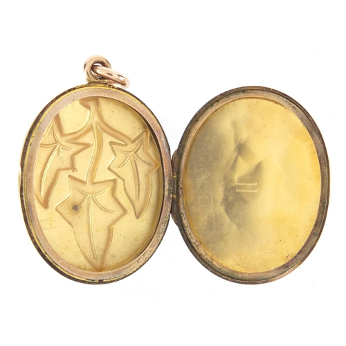 857 - Victorian unmarked gold locket with ivy leaf decoration, 4cm in length, approximate weight 12.7g