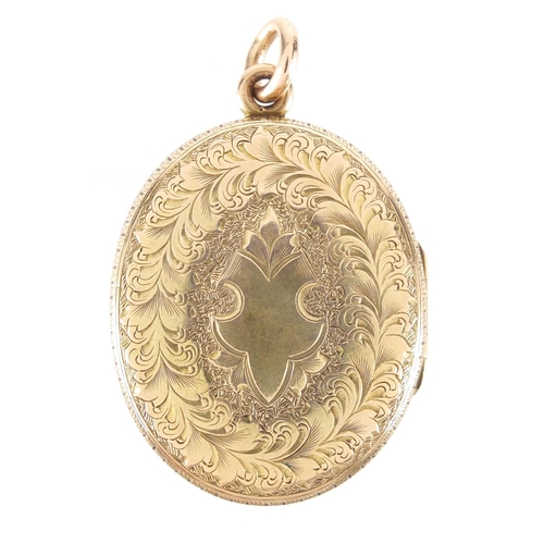 857 - Victorian unmarked gold locket with ivy leaf decoration, 4cm in length, approximate weight 12.7g