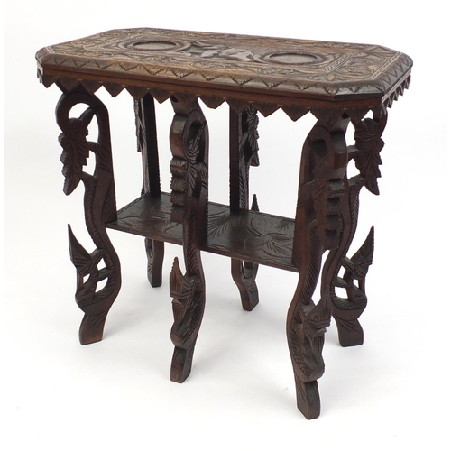18 - Carved wood occasional table with under tier, the top carved with an elephant, 65cm H x 67cm W x 37c... 