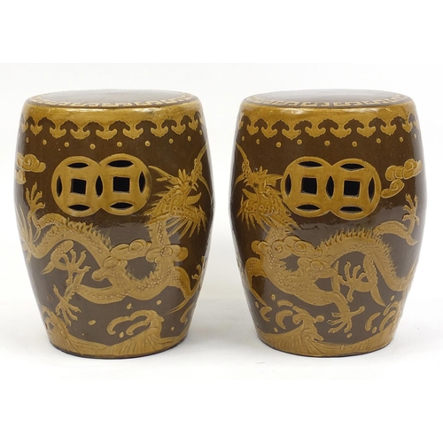 2061 - Pair of Chinese stoneware drum garden seats, decorated with dragons chasing the flaming pearl, each ... 