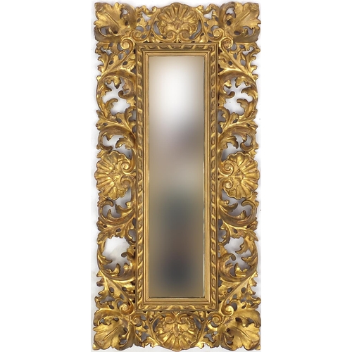 2027 - Rectangular gilt wood mirror carved with a camphor leaves, with bevelled glass plate 75cm x 37cm