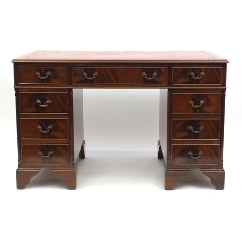 2 - Mahogany twin pedestal desk, fitted with nine drawers and tooled leather insert, 77cm H x 122cm W x ... 