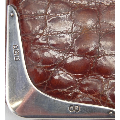 21 - Mappin & Webb snake skin wallet with silver mounted corners, London 1931, 15cm high