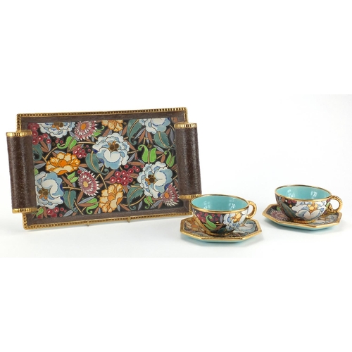 669 - Belgium pottery tea for two on tray by Boch Freres, hand painted with stylised flowers within gilt b... 