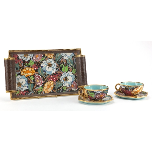 669 - Belgium pottery tea for two on tray by Boch Freres, hand painted with stylised flowers within gilt b... 