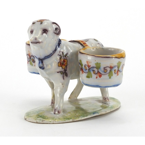 597 - Rouen faience glazed pottery double salt in the form of a ram, hand painted with flowers on a grassy... 