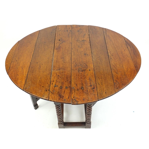 2034 - Antique oak gate leg table on bobbin turned legs, 72cm H x 123cm W x 103cm D