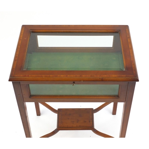 2029 - Inlaid yew bijouterie table with bevelled glass and under tier, 77cm H x 57cm W x 40cm D