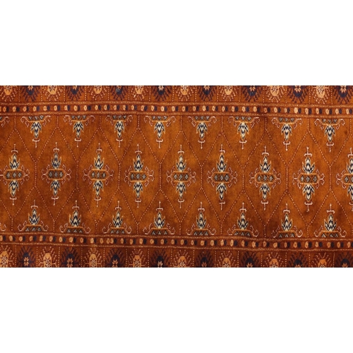 2040 - Rectangular Pakistan carpet runner having an all over geometric design, 195cm x 65cm