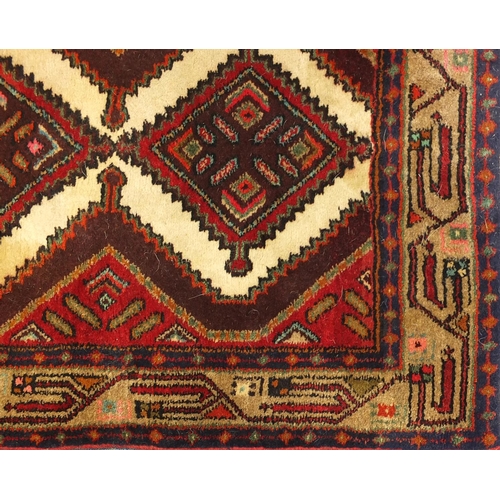 2015 - Rectangular Persian tribal carpet runner having an all over geometric design onto a red ground, 250c... 