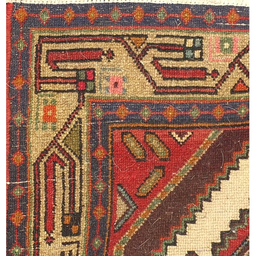 2015 - Rectangular Persian tribal carpet runner having an all over geometric design onto a red ground, 250c... 
