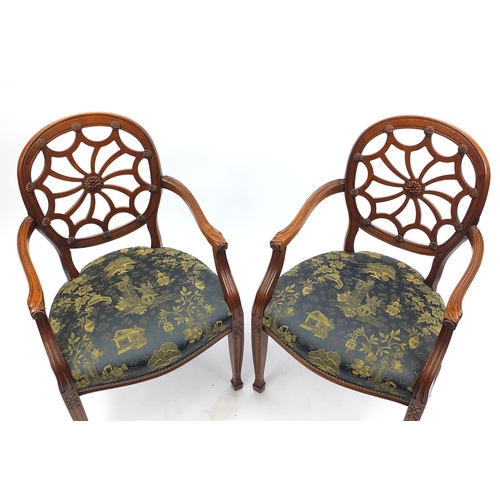 2042 - Pair of Stuart Jones mahogany open arm chairs, the seats upholstered in the Chinoiserie manner, each... 