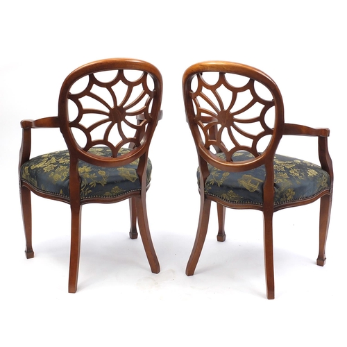 2042 - Pair of Stuart Jones mahogany open arm chairs, the seats upholstered in the Chinoiserie manner, each... 