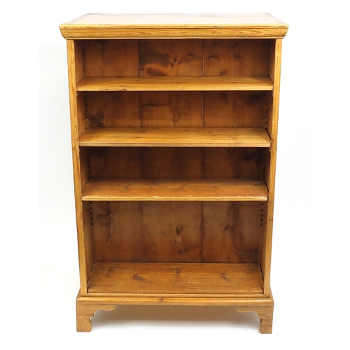 2018 - Victorian stripped pine double sided library bookcase fitted with eight adjustable shelves, 136cm H ... 