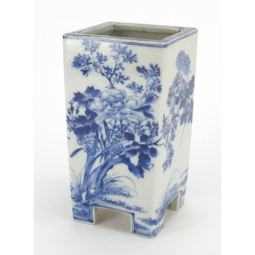 466 - Japanese porcelain blue and white footed vase, decorated with flowers, 20cm high