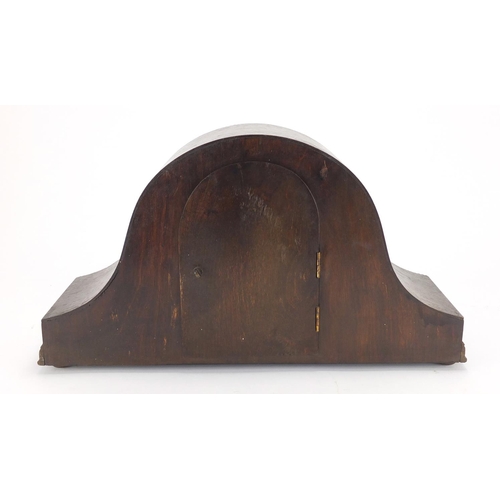 115 - Oak Napoleon hat shaped mantel clock with oval silvered dial and brass Arabic numerals, 25cm high